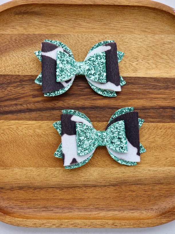 Cow Print & Green Glitter Piggies Bow Set – Handmade Farm-Themed Pigtail Bows