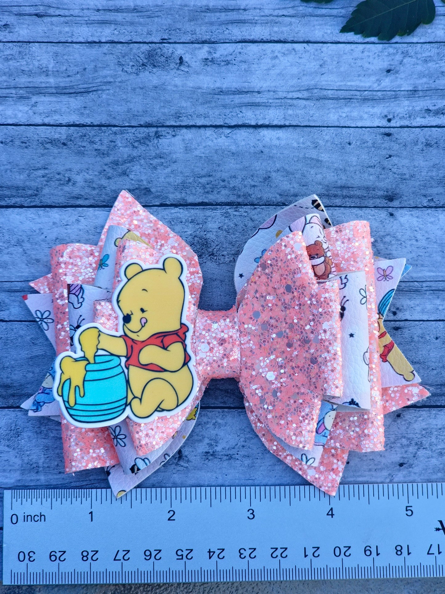 Handcrafted Winnie the Pooh Glitter Bow - A Sweet and Sparkly Accessory